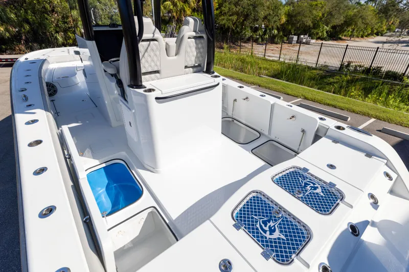 Slide: The Image of 2024 Freeman 28 boat interior with seating and storage compartments. - 20