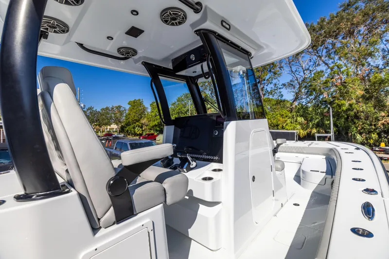 Slide: The Image of 2024 Freeman 28 boat interior with modern seating and control panel. - 23