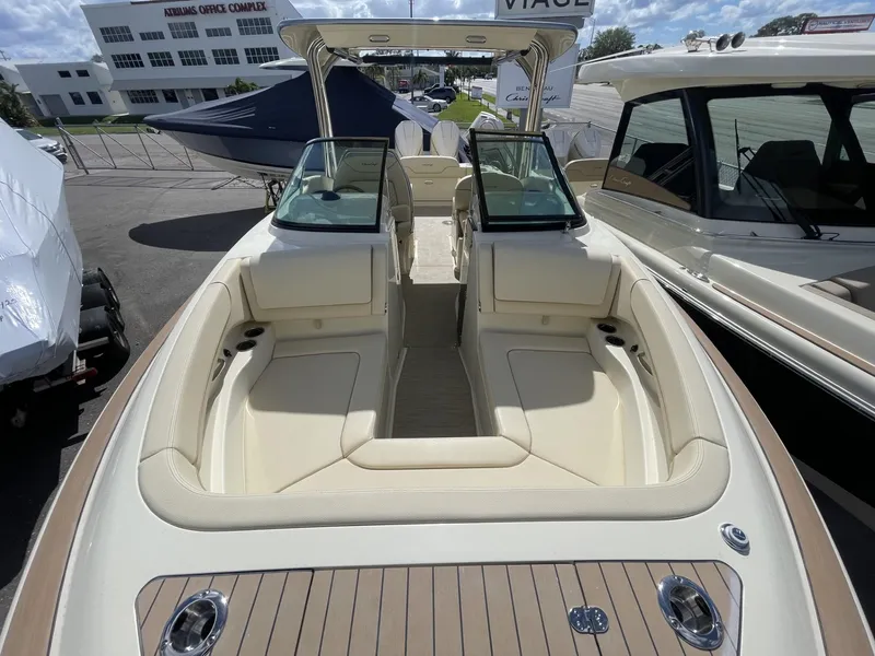 Slide: The Image of 2025 Chris-Craft Calypso 28 boat with spacious seating and elegant design. - 16