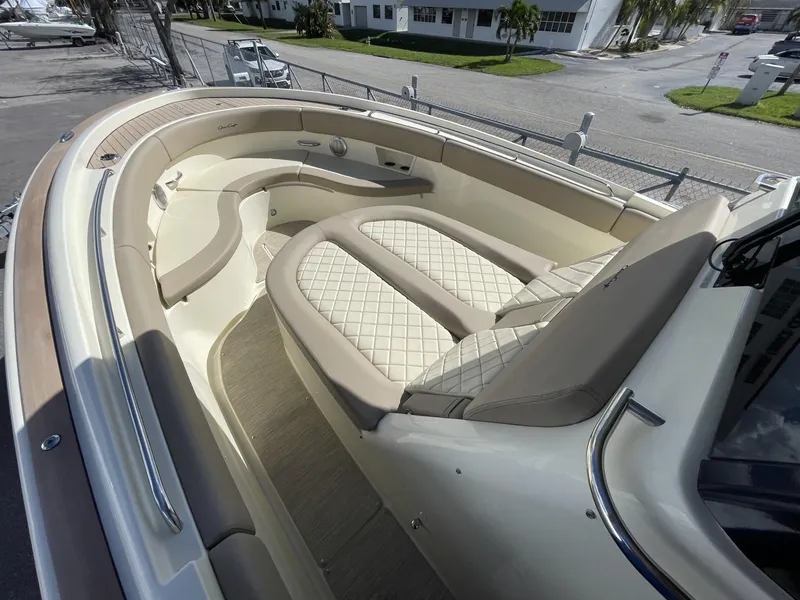 Slide: The Image of 2025 Chris-Craft Catalina 30 boat with luxurious seating and elegant design. - 12