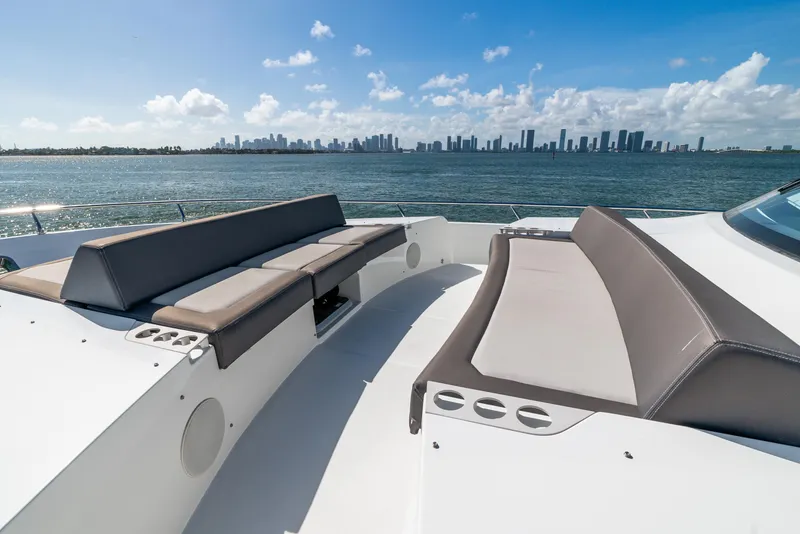 Slide: The Image of Luxurious 2021 Ocean Alexander 70E Motoryacht with city skyline view. - 23