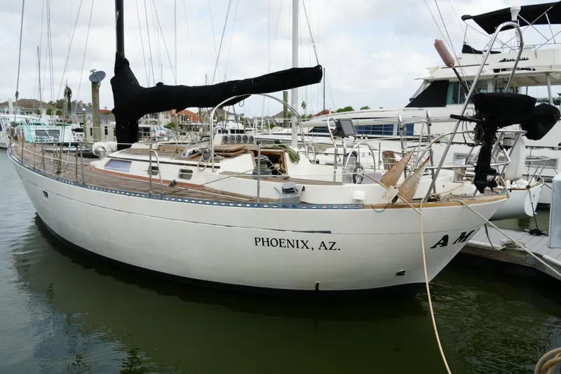 The Image of 1980 Lafitte 44 Cutter sailboat docked in a marina, Phoenix, AZ. - 1