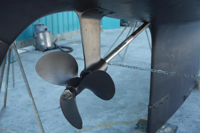 Slide: The Image of Propeller of 1980 Lafitte 44 Cutter sailboat in dry dock. - 49