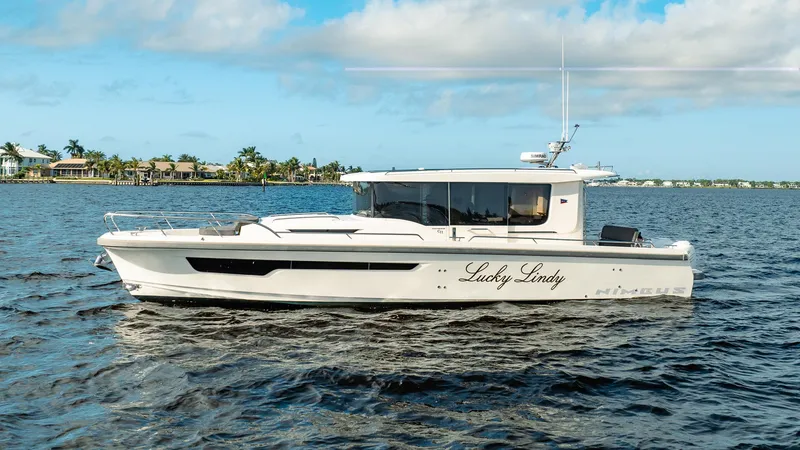 Slide: The Image of 2023 Nimbus Commuter 11 boat "Lucky Lindy" cruising on a sunny day. - 1