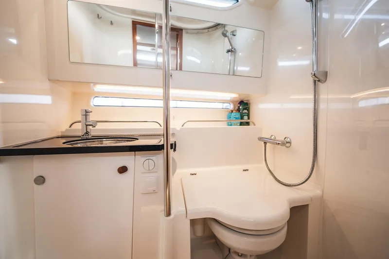 Slide: The Image of Modern bathroom in 2023 Nimbus Commuter 11 boat with shower and sink. - 36