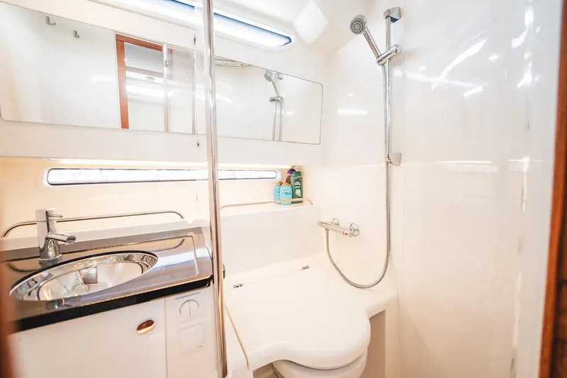 Slide: The Image of Modern bathroom in 2023 Nimbus Commuter 11 boat with shower and sink. - 37