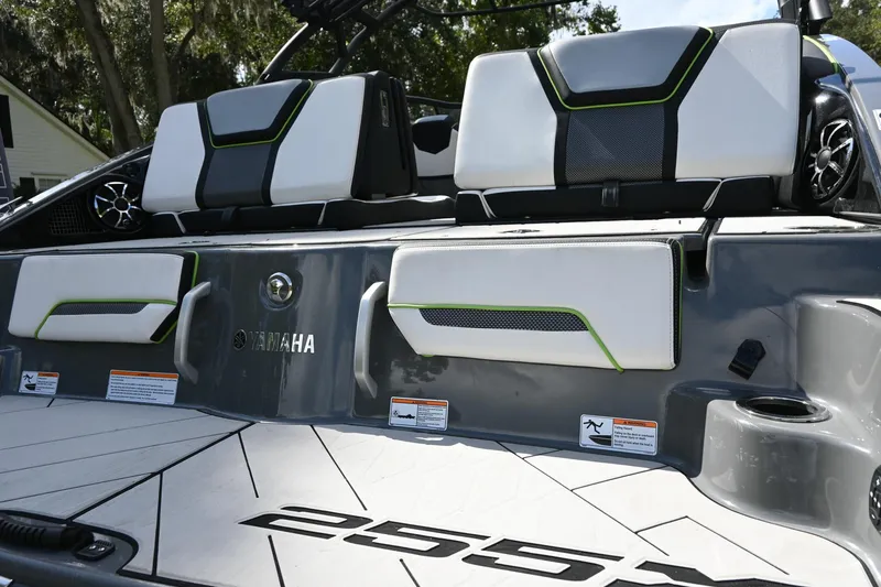 Slide: The Image of 2021 Yamaha Boats 255XD, sleek seating and deck design, featuring modern accents. - 32