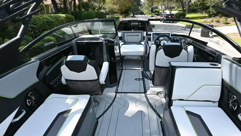 Slide: The Image of Interior of 2021 Yamaha Boats 255XD, featuring sleek seating and modern design. - 4