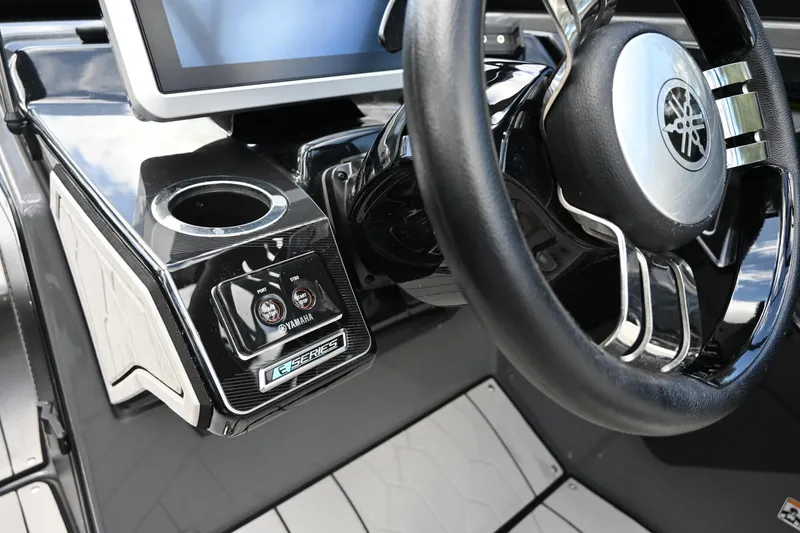 Slide: The Image of Yamaha Boats 2021 255XD steering wheel and dashboard with touchscreen display. - 8