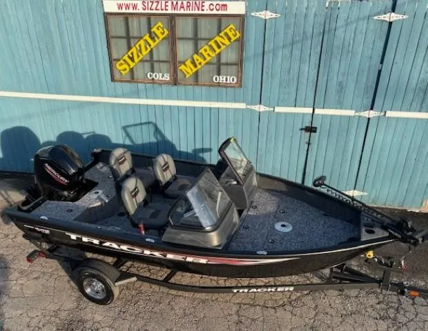Slide: The Image of 2025 Tracker Pro Guide V-16 WT boat at Sizzle Marine, Ohio dealership. - 5