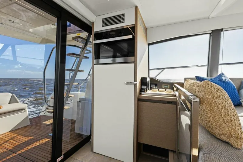 Slide: The Image of Interior of 2022 Prestige 460 yacht with modern design and ocean view. - 17