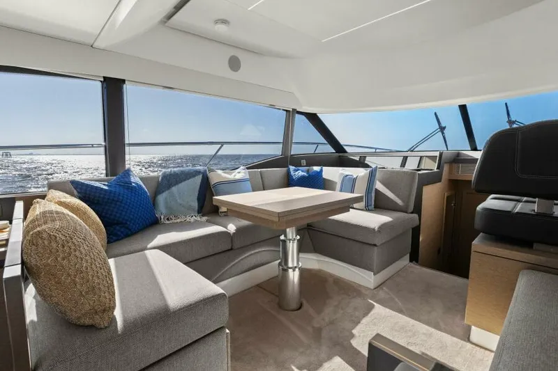 Slide: The Image of Luxurious interior of 2022 Prestige 460 yacht with ocean view and modern seating. - 20