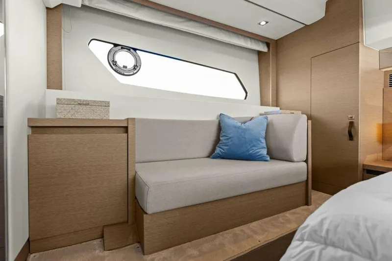 Slide: The Image of Luxurious interior of 2022 Prestige 460 yacht with modern seating and elegant decor. - 27