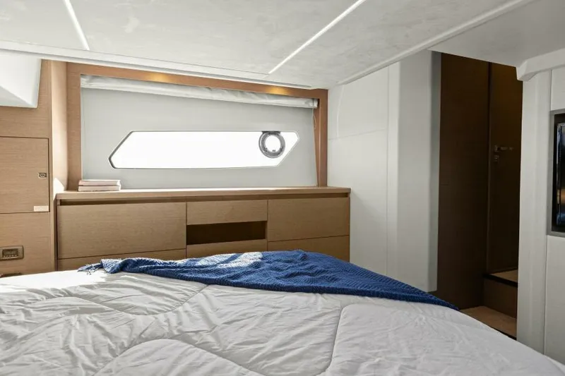 Slide: The Image of Luxurious cabin interior of 2022 Prestige 460 yacht with modern furnishings. - 28