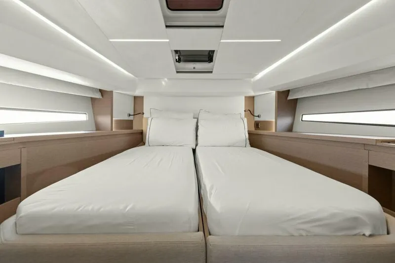 Slide: The Image of Luxurious twin beds in 2022 Prestige 460 yacht cabin interior. - 33