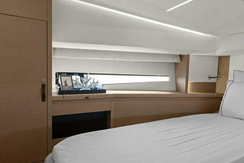 Slide: The Image of Luxurious cabin interior of 2022 Prestige 460 yacht with modern design and natural light. - 35
