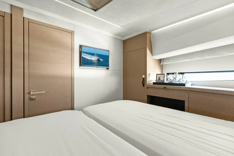 Slide: The Image of Luxurious cabin interior of 2022 Prestige 460 yacht with modern decor. - 37