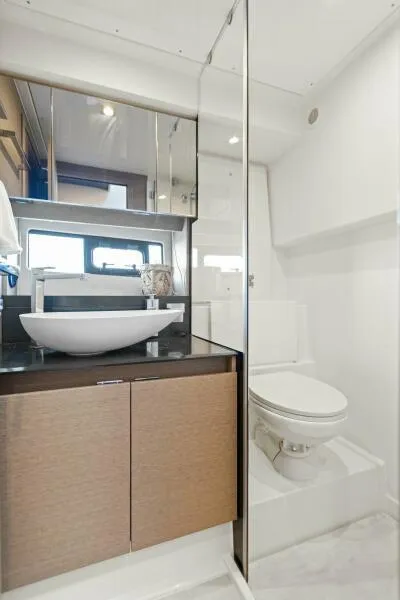 Slide: The Image of Luxurious bathroom in 2022 Prestige 460 yacht with modern fixtures and elegant design. - 38