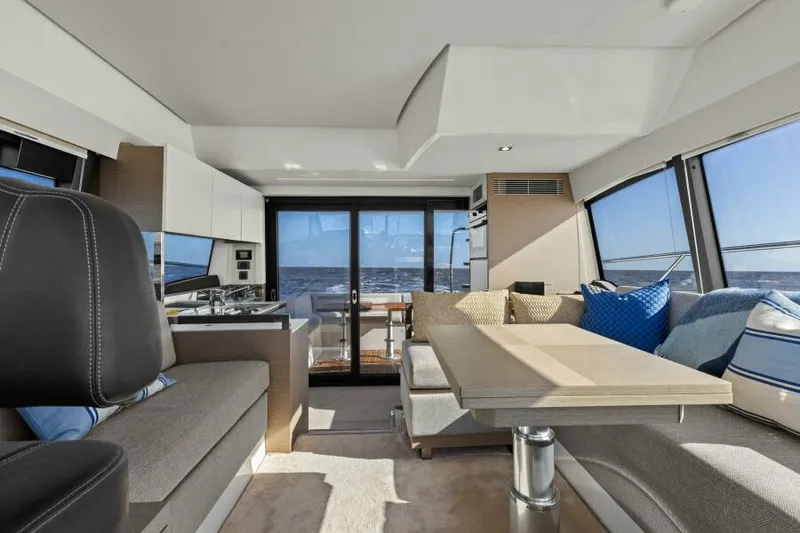 Slide: The Image of Luxurious interior of 2022 Prestige 460 yacht with modern seating and ocean view. - 4