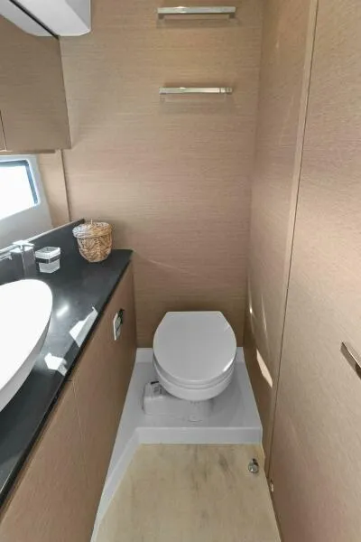 Slide: The Image of Modern bathroom in 2022 Prestige 460 yacht with sleek design and compact toilet. - 41