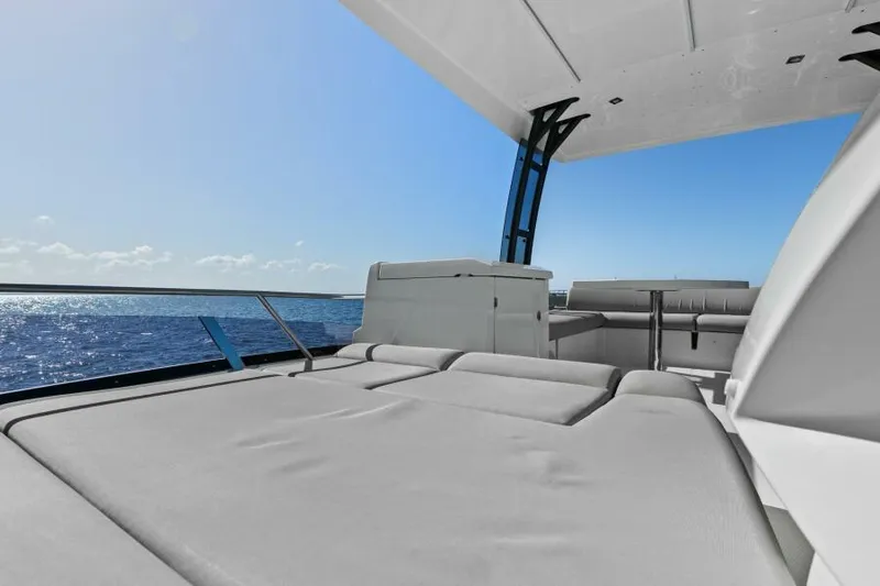Slide: The Image of Prestige 460 yacht 2022 model, spacious deck with ocean view. - 47