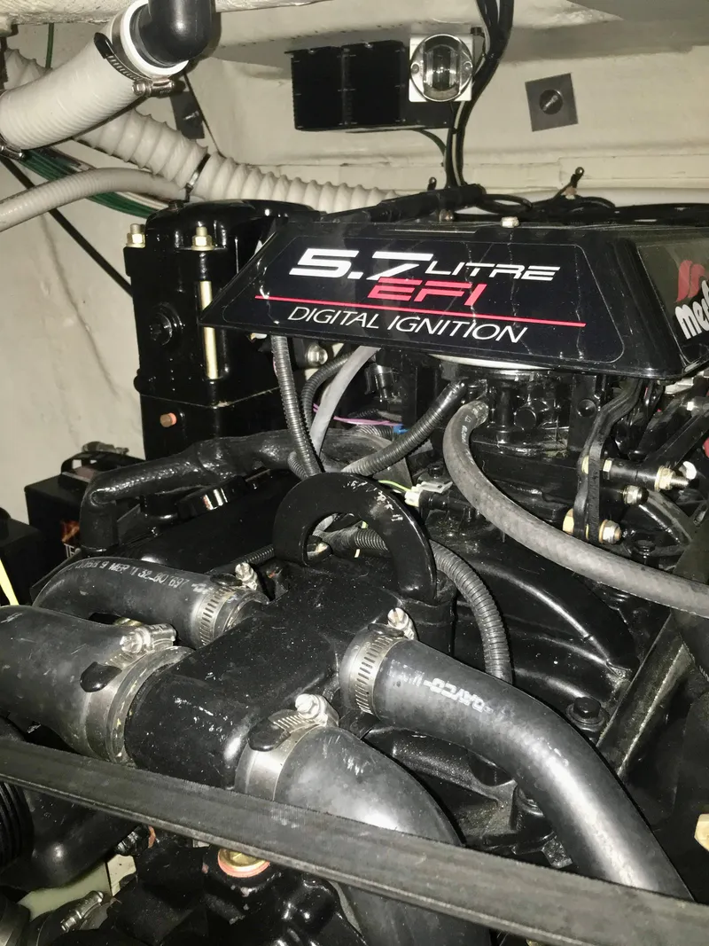 Slide: The Image of 5.7L EFI engine in 2001 Cruisers Yachts 3075 Express boat. - 23