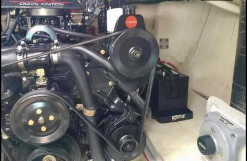 Slide: The Image of Engine compartment of 2001 Cruisers Yachts 3075 Express, featuring digital ignition system. - 25