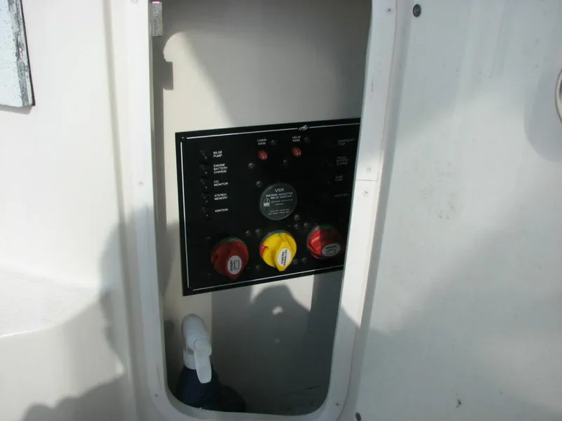 Slide: The Image of Control panel of a 2013 Monterey 280 Sport Yacht with switches and dials. - 10