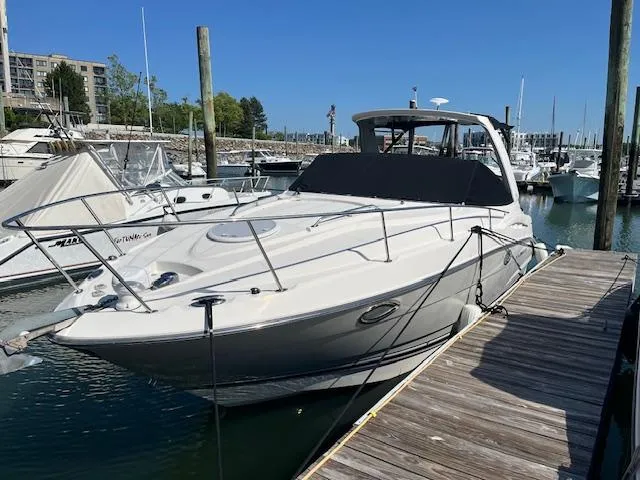 Slide: The Image of 2013 Monterey 280 Sport Yacht docked at marina under clear blue sky. - 16