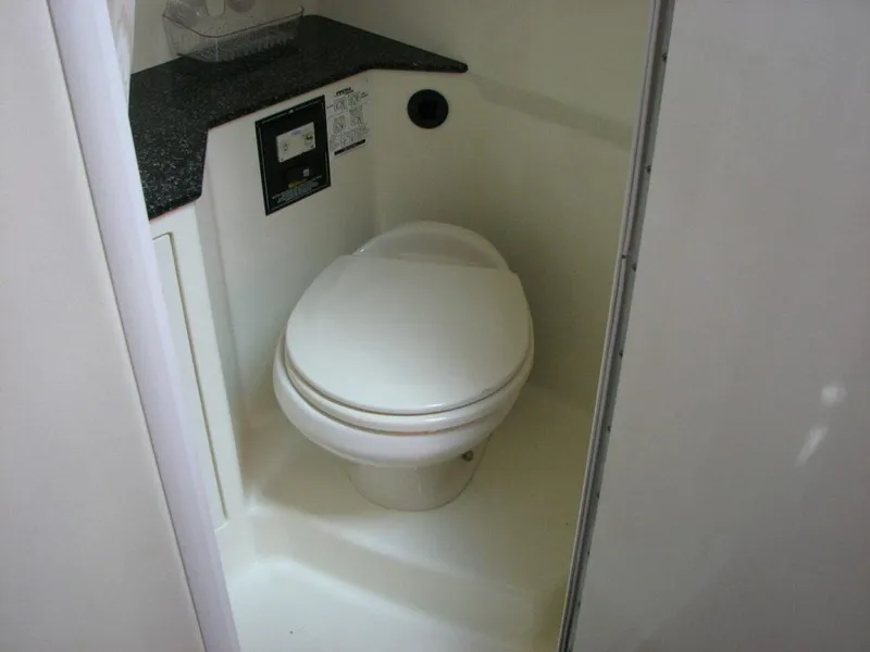 Slide: The Image of Toilet in 2013 Monterey 280 Sport Yacht bathroom. - 7