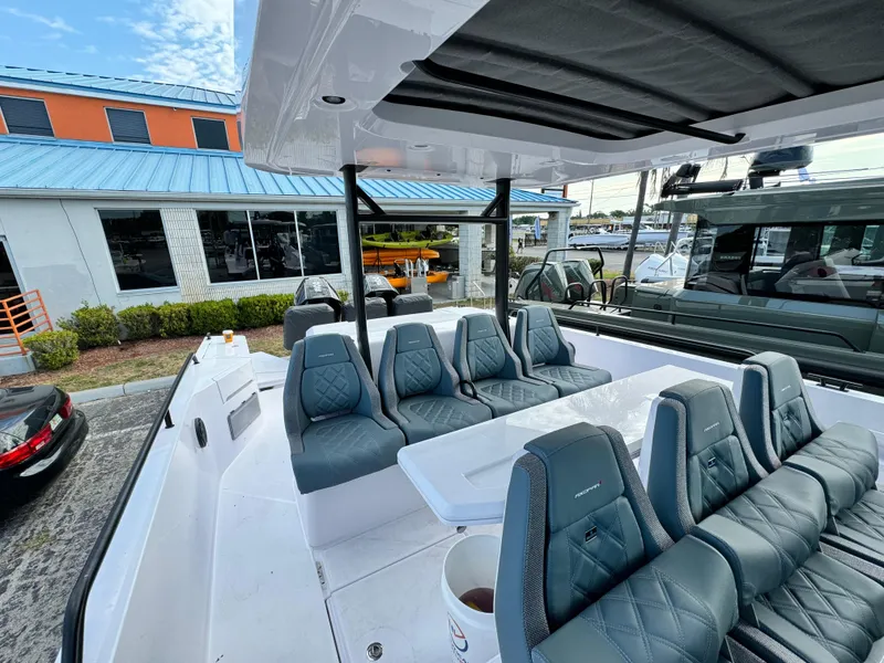 Slide: The Image of 2024 Axopar Sun Top boat with luxurious seating and modern design. - 16