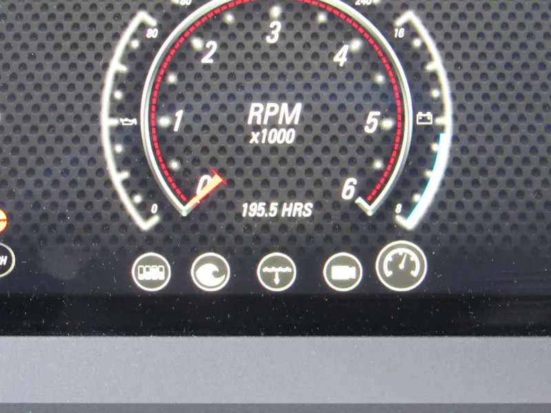 Slide: The Image of 2022 Malibu M220 dashboard showing RPM gauge and 195.5 hours usage. - 17