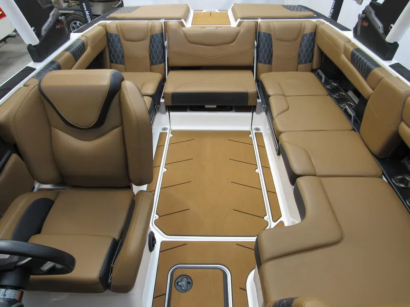Slide: The Image of Luxurious interior of 2022 Malibu M220 boat with tan seating and modern design. - 20