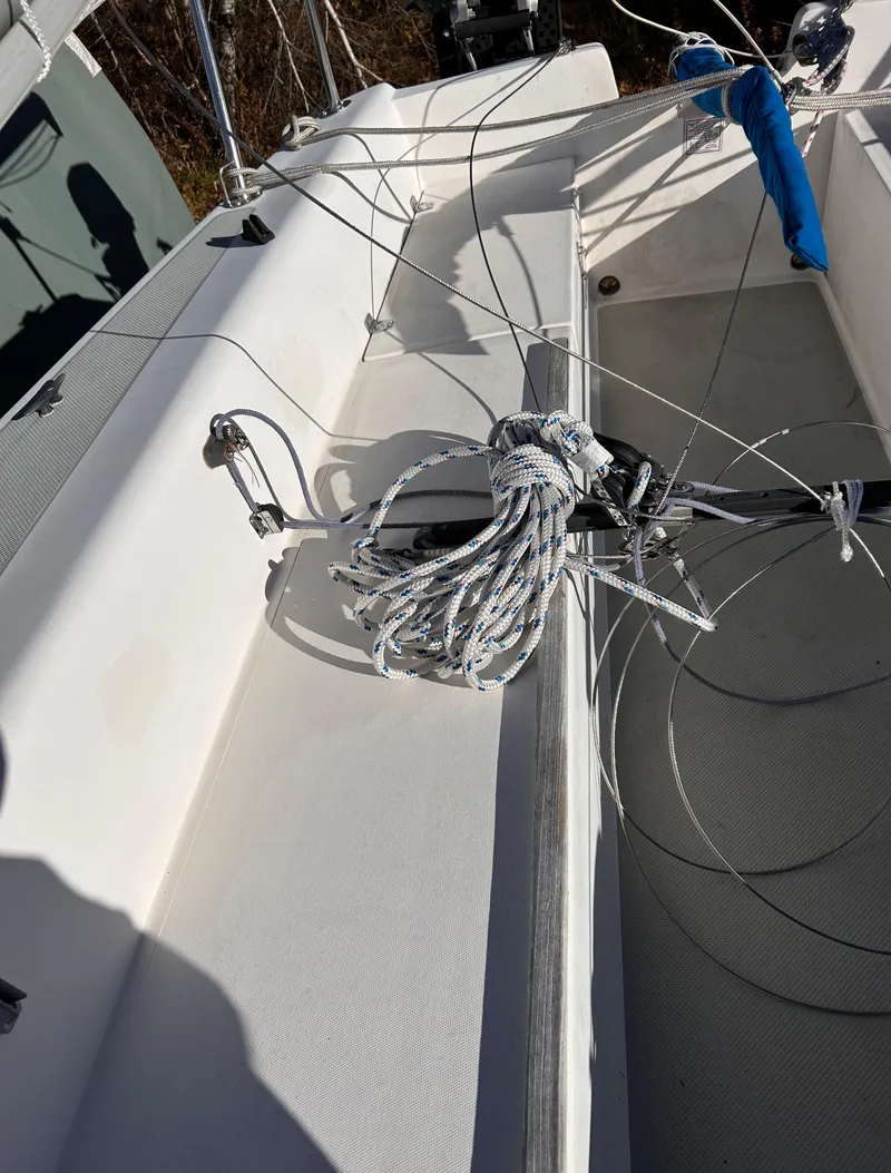 Slide: The Image of 1987 Catalina 22 Capri sailboat deck with rigging and ropes. - 15