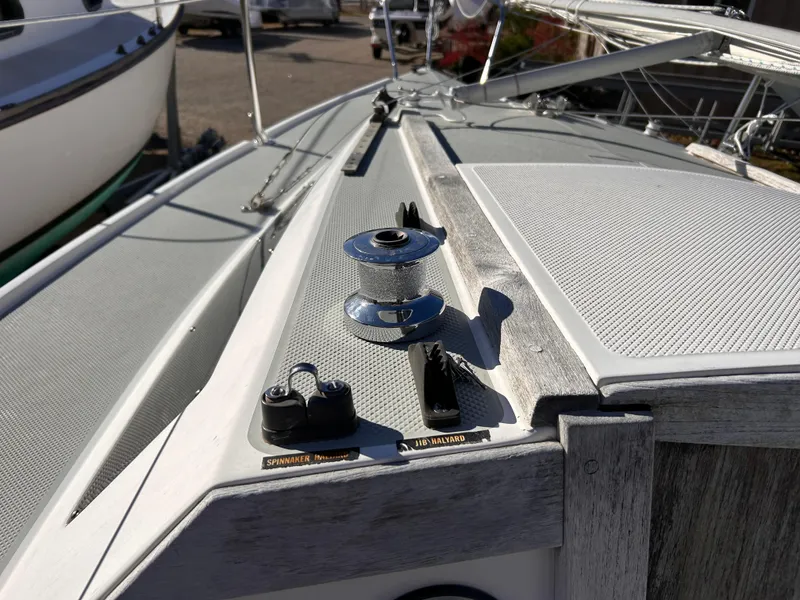 Slide: The Image of 1987 Catalina 22 Capri sailboat deck with winch and cleats. - 18