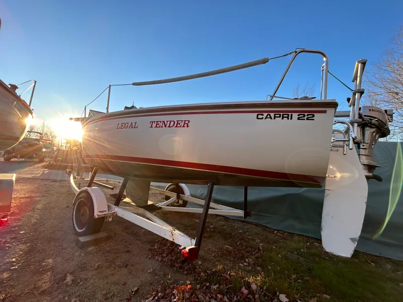 Slide: The Image of 1987 Catalina 22 Capri sailboat on trailer at sunset. - 2