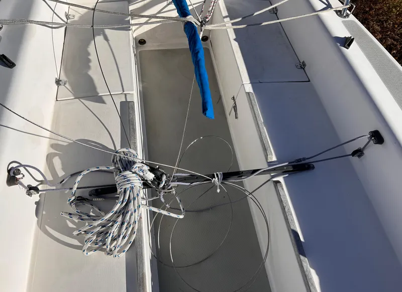 Slide: The Image of 1987 Catalina 22 Capri sailboat cockpit with rigging and ropes. - 23