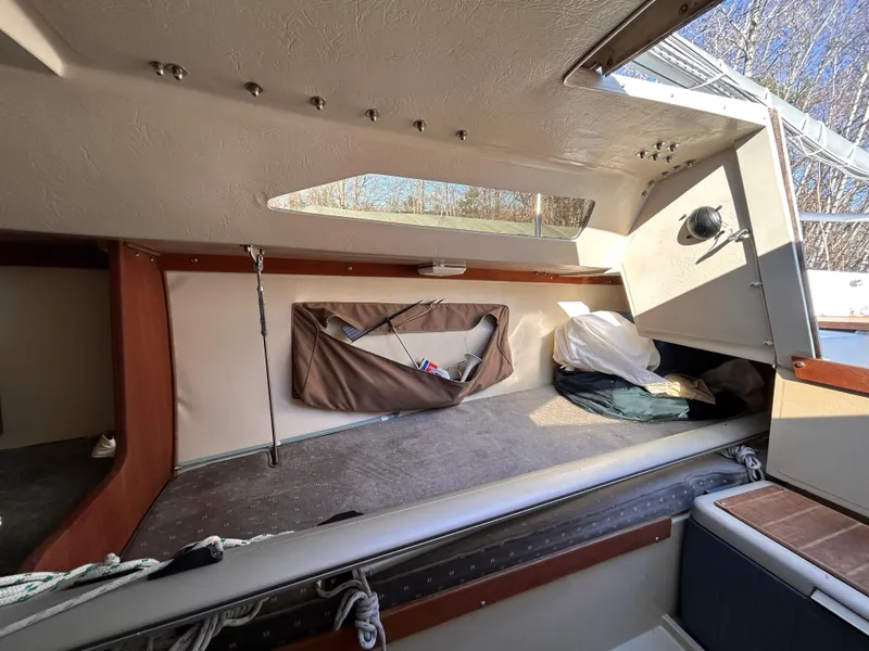 Slide: The Image of Interior of 1987 Catalina 22 Capri sailboat cabin with storage and seating. - 30