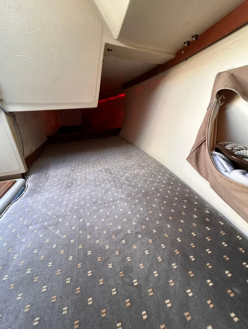 Slide: The Image of Interior cabin of 1987 Catalina 22 Capri sailboat with carpeted flooring. - 33