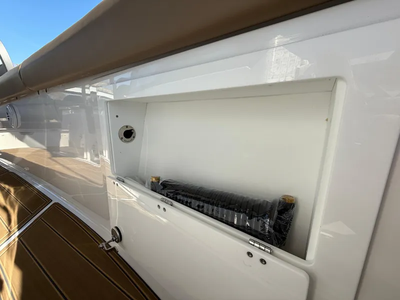 Slide: The Image of 2025 Monterey Elite 30 OB boat storage compartment with sleek design and modern features. - 17