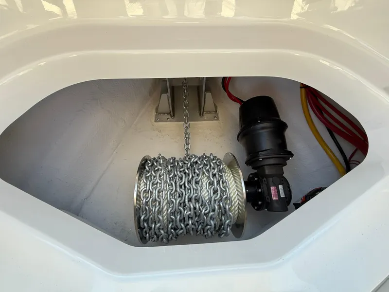 Slide: The Image of Anchor chain compartment of 2025 Monterey Elite 30 OB boat. - 23