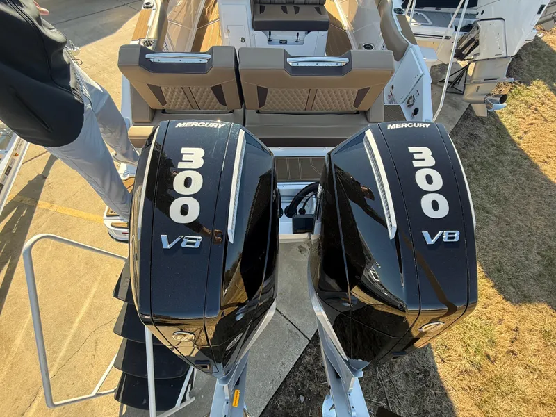 Slide: The Image of Twin Mercury 300 V8 engines on a 2025 Monterey Elite 30 OB boat. - 5