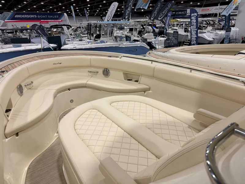 Slide: The Image of Luxurious interior of 2025 Chris-Craft Catalina 30 at a boat show. - 14