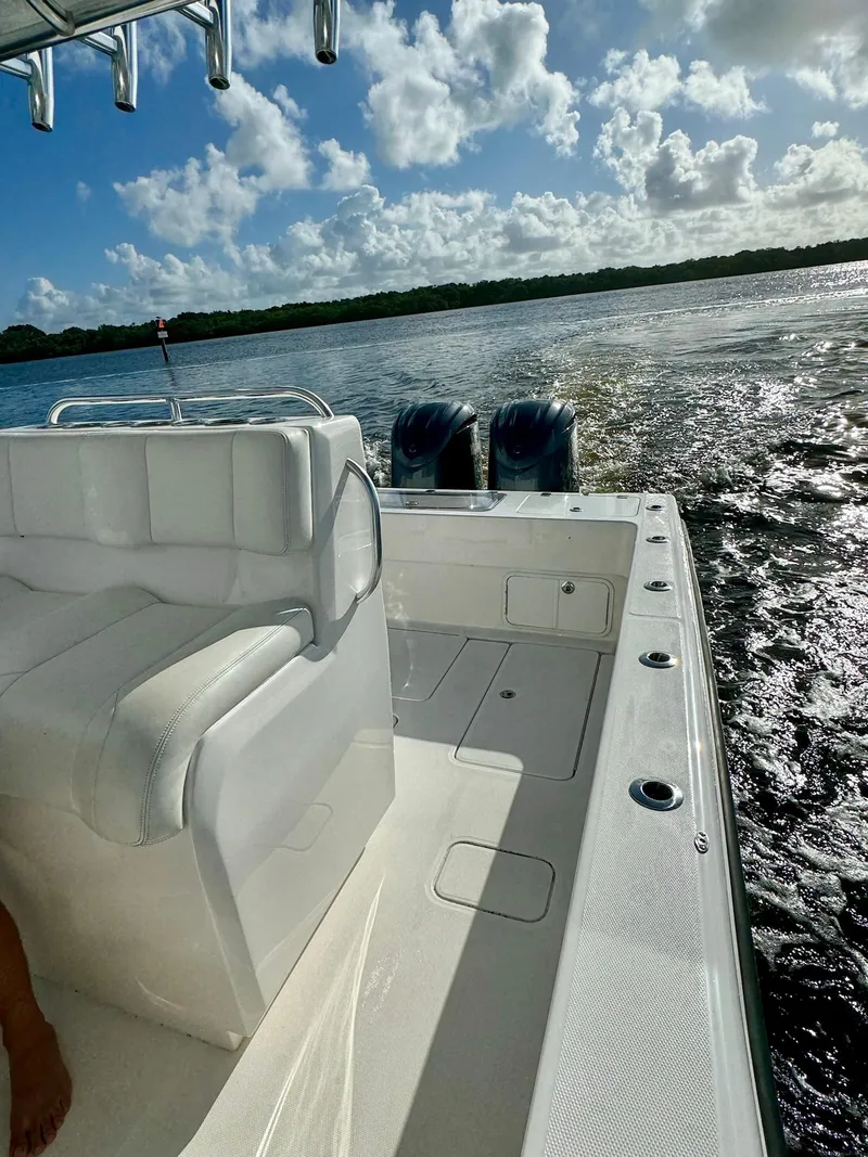 Slide: The Image of 2020 Invincible 33 Open Fisherman boat cruising on a sunny day. - 19