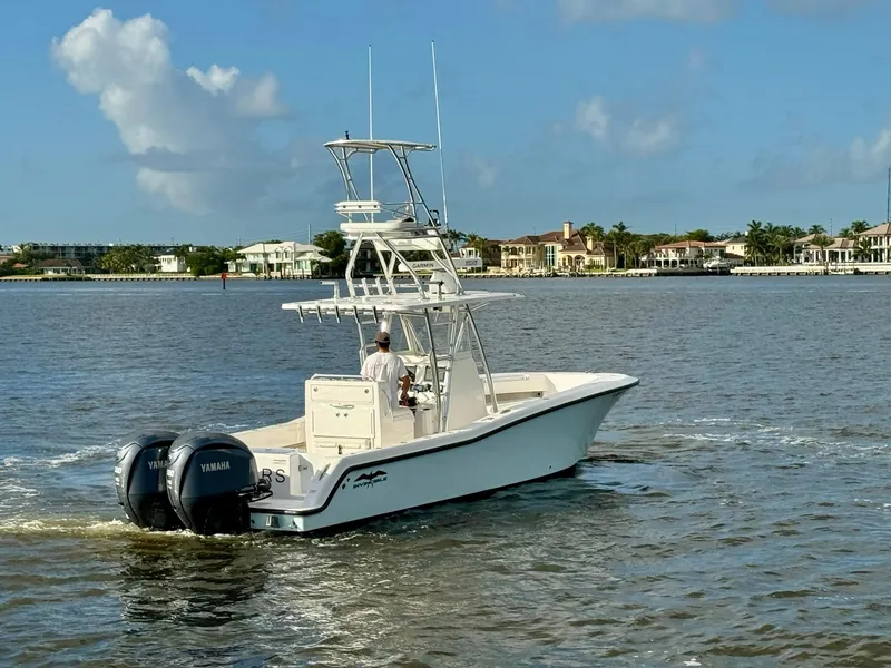 Slide: The Image of 2020 Invincible 33 Open Fisherman boat cruising on a sunny day. - 31