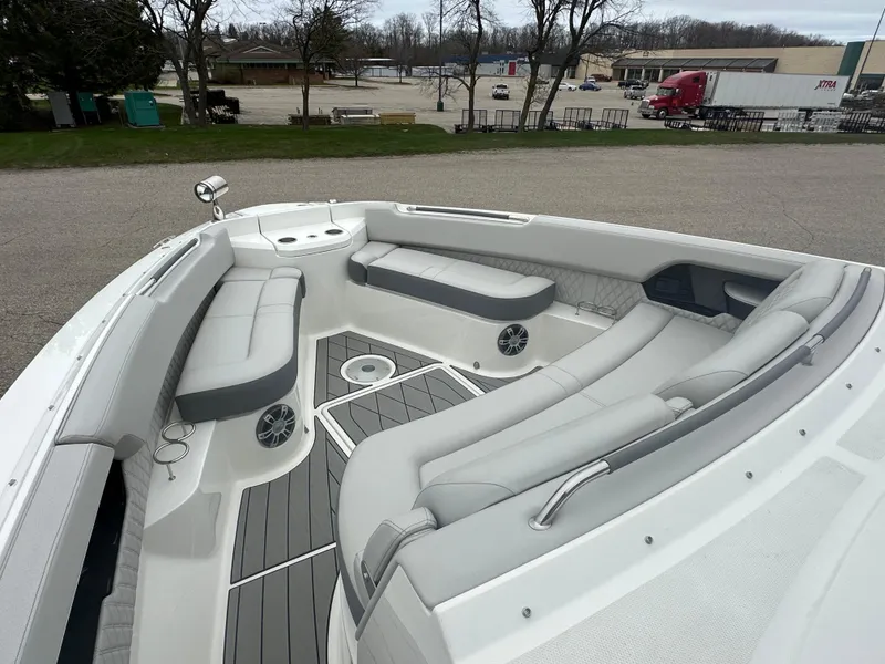 Slide: The Image of 2025 Sea Ray SLX 400 OB boat with spacious seating and modern design. - 7