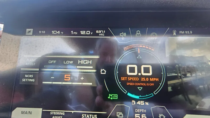 Slide: The Image of Dashboard of a 2018 Nautique Super Air Nautique G25 boat showing speed and settings. - 15