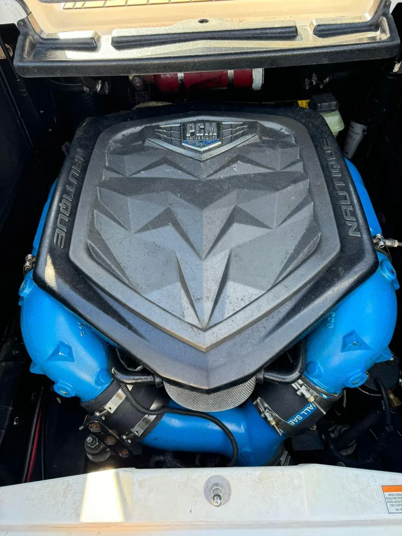Slide: The Image of 2018 Nautique Super Air Nautique G25 engine with PCM cover, showcasing powerful marine performance. - 18