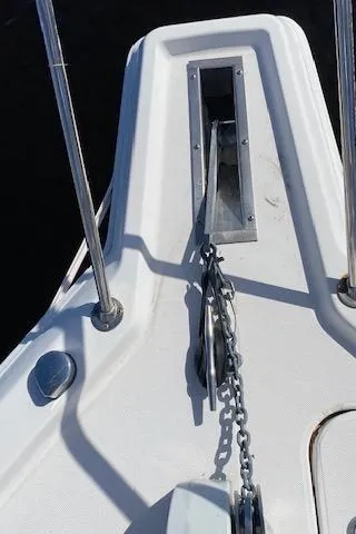 Slide: The Image of 2005 Pro-Line Express boat anchor chain and deck detail. - 15