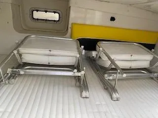 Slide: The Image of Interior of 2005 Pro-Line Express boat with foldable seats and window. - 21